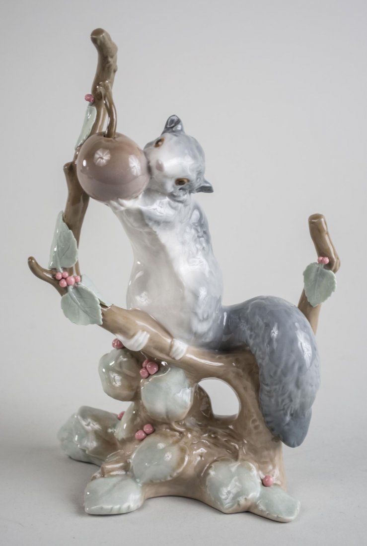 Lladro Porcelain Figure of a Squirrel on a Branch: Reference number #4774 'Doormouse', sculpted by Fulgencio Garcia, issued in 1971 and retired in 1983. Height 9 1/2 inches. Notice to bidders: Condition reports and additional photographs are provided 