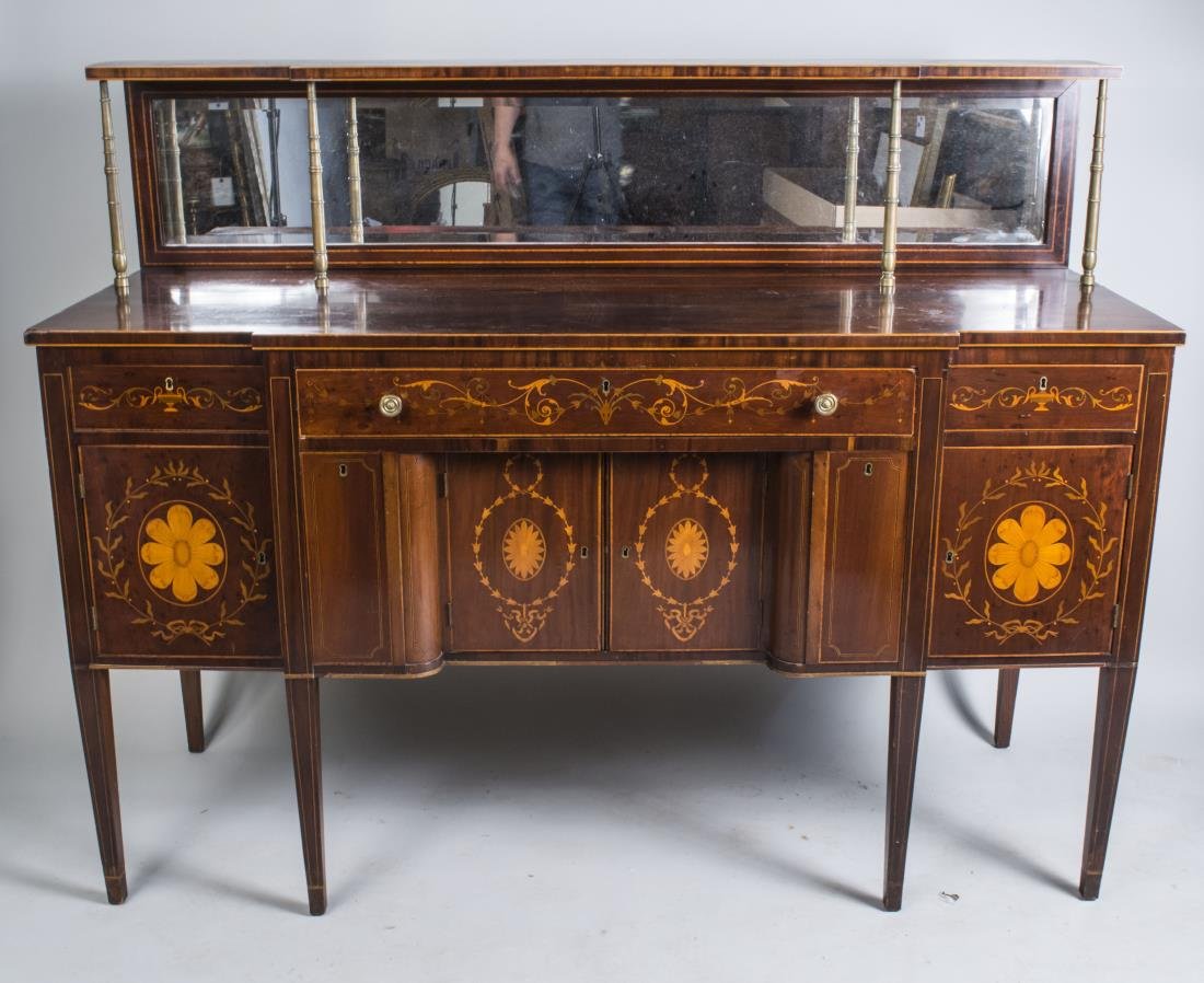 Federal Inlaid Mahogany Sideboard: Rectangular breakfronted top with line edging and a setback raised open shelf, over a central drawer flanked by two short drawers, all over a center two door cabinet flanked by two cabinets, on square