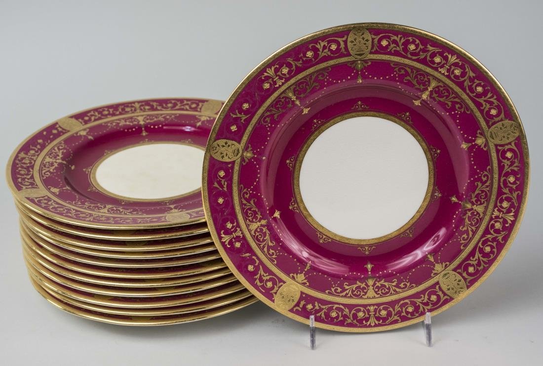 Set of Twelve Minton Porcelain Plates: Gilt and rose decoration. Diameter 8 3/4 inches. Notice to bidders: Condition reports and additional photographs are provided by request as a courtesy to our clients, as such any condition report is o