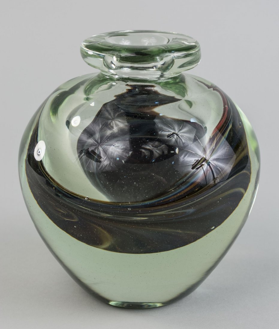 Jean-Claude Novaro Art Glass Vase: Ring neck, ovoid body with internal decoration, signed on the base. Height 6 3/4 inches. Notice to bidders: Condition reports and additional photographs are provided by request as a courtesy to our cl