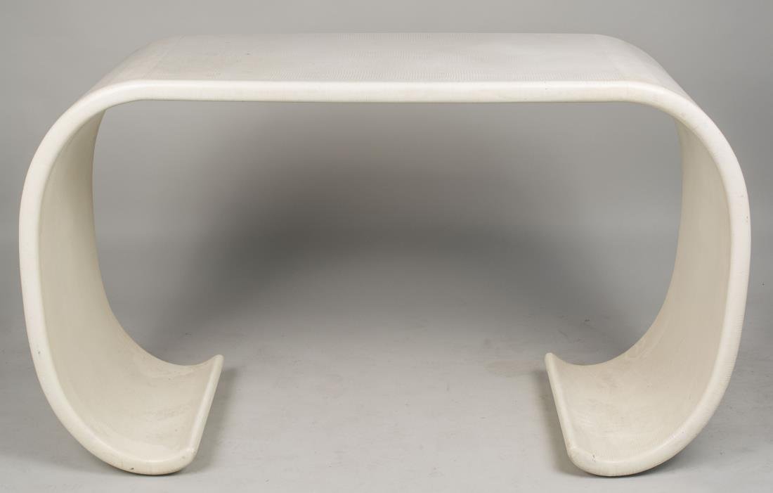 Karl Springer Style Reptile Console: Rectangular top bending to form incurved side panels. Height 34 inches, width 58 inches, depth 21 inches. Notice to bidders: Condition reports and additional photographs are provided by request as a c