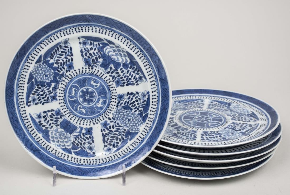 Set of Six Blue and White Chinese Porcelain Plates: 18th century, floral decoration, some with minor chips to rim. Diameter, 7 3/4 inches. Provenance: From the Collection of Erwin A. Raible Notice to bidders: Condition reports and additional photograph
