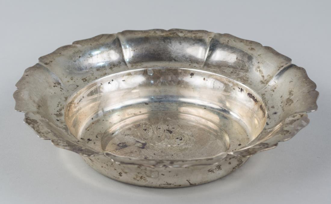 Webb C. Ball Co. Sterling Silver Bowl: CIrcular bowl with scalloped rim. 416 grams, diameter 8 1/2 inches. Provenance: From the Collection of Erwin A. Raible Notice to bidders: Condition reports and additional photographs are provided by r
