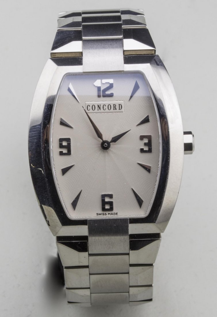 Concord Man's Watch: Guilloche enamel dial with Arabic quarter and baton hours, signed, no.1310547, stainless steel band. Notice to bidders: Condition reports and additional photographs are provided by request as a courte