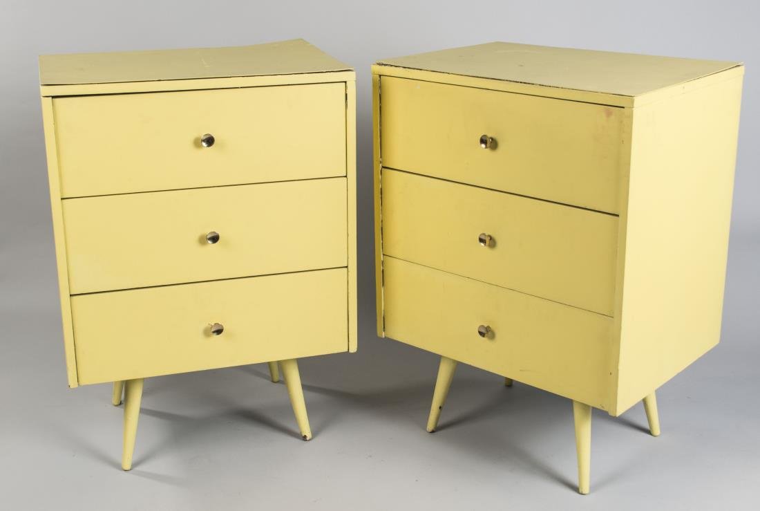Pair of Paul McCobb Side Tables: Paul McCobb yellow painted three drawer tables with label in drawer, on round tapered legs. Height 34 inches, width 24 inches, depth 18 inches. Notice to bidders: Condition reports and additional phot