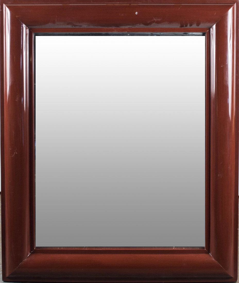 Carson Lacquered Mirror: Ogee molded frame. 46 x 39 inches. Notice to bidders: Condition reports and additional photographs are provided by request as a courtesy to our clients, as such any condition report is only an opinion