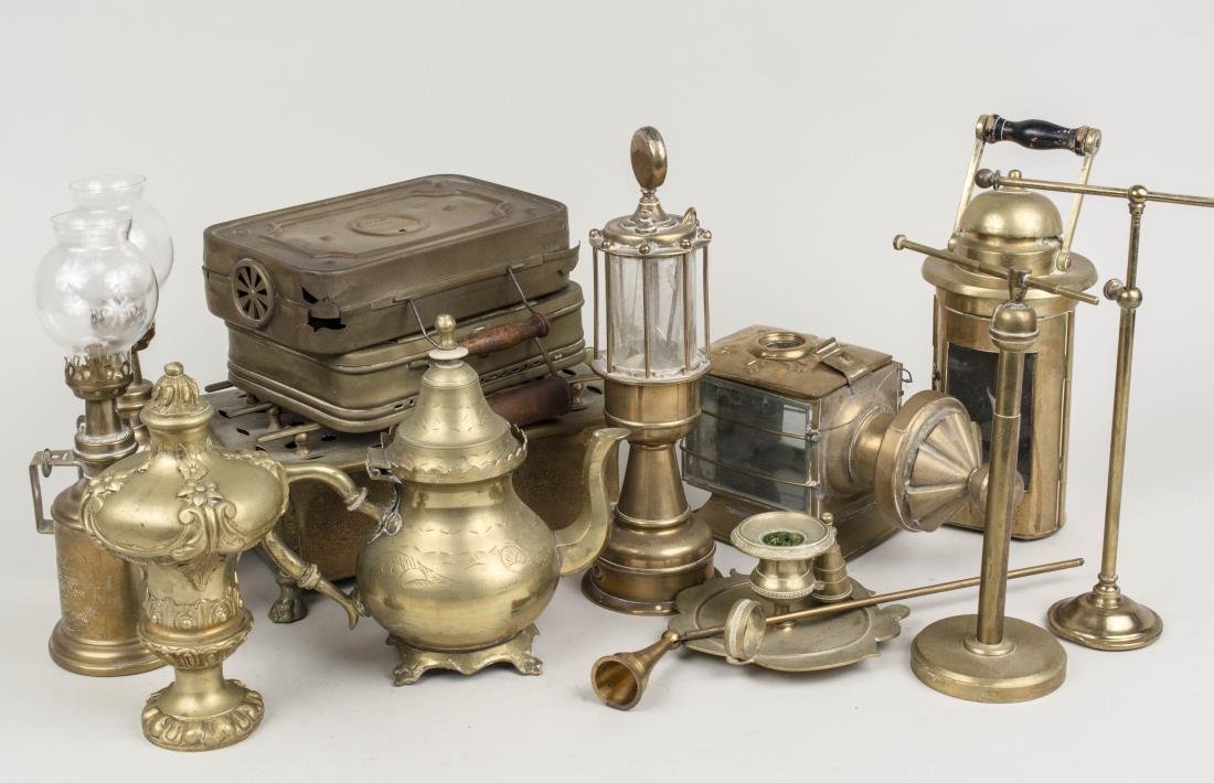 Group of Brass Decorations: Including lamps, boxes, etc. Various sizes. Notice to bidders: Condition reports and additional photographs are provided by request as a courtesy to our clients, as such any condition report is only a