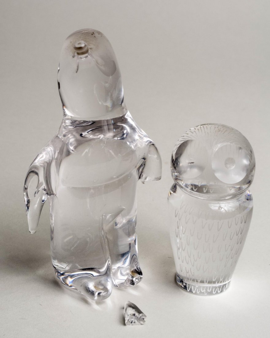 Glass Owl and Penguin: Penguin has broken wing. Height 6 1/4 inches. Notice to bidders: Condition reports and additional photographs are provided by request as a courtesy to our clients, as such any condition report is only