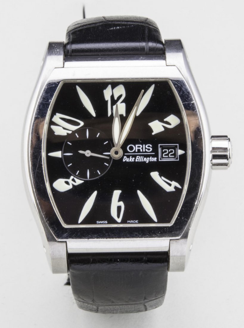 Oris Wristwatch: Duke Ellington Limited Edition 717/999 watch, stainless steel watch, black dial with Arabic and baton numerals and subsidiary seconds dial, date aperture, skeletonized back, no. 24 - 77602, black leat