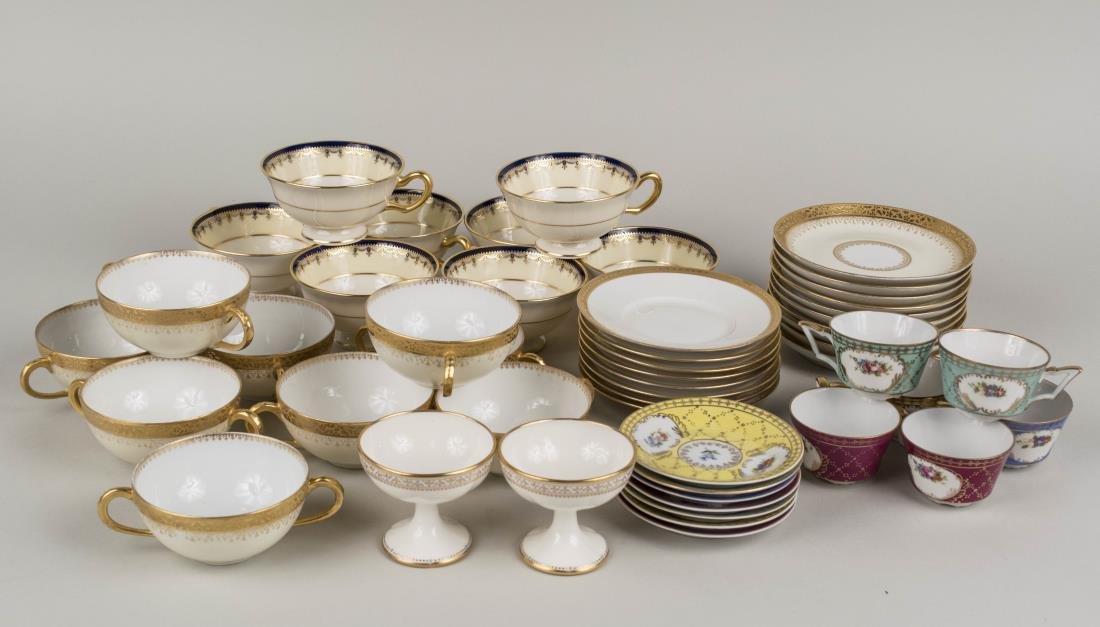 Group of Porcelain Table Articles: Approximately forty eight pieces, various makers and patterns, many patterns with gilt border. Notice to bidders: Condition reports and additional photographs are provided by request as a courtesy to 