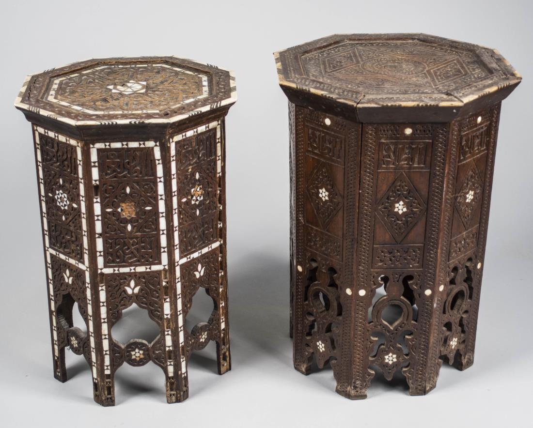 Two Moroccan Tables: Both with octagonal top with inlaid bone geometric decoration. Larger. Height 23 inches, width 16 inches, depth 16 inches. Notice to bidders: Condition reports and additional photographs are provided 