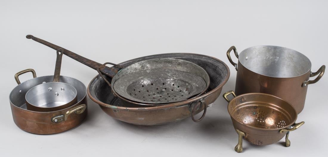 Group of Copper Cookware: Including saucepans, pots, a colander, etc. Colander diameter 13 3/4 inches. Notice to bidders: Condition reports and additional photographs are provided by request as a courtesy to our clients, as su