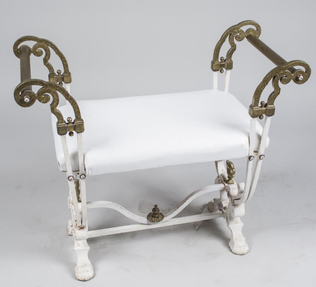 Painted Metal Window Bench: Rectangular upholstered seat flanked by outscrolled arms, on a white painted metal base. Height 30 inches, width 32 inches, depth 15 inches. Notice to bidders: Condition reports and additional photogr
