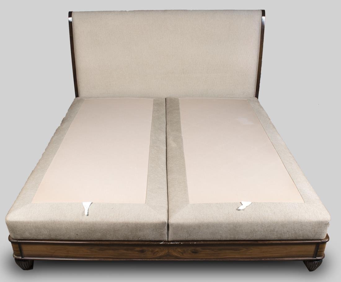 King Size Exotic Wood Bed: Contemporary style upholstered headboard. Height 51 inches, width 6 feet 6 inches, depth 7 feet 3 inches. Notice to bidders: Condition reports and additional photographs are provided by request as a c