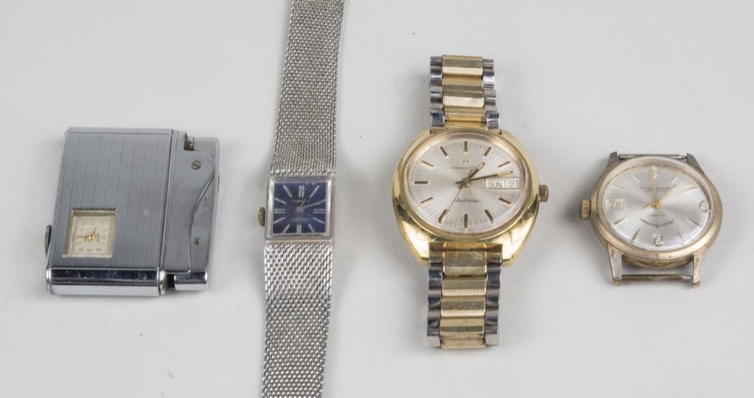 Group of Four Watches: Including Vulcain, Andre Bouchard, Hamilton Electronic and a Bucherer cigarette lighter with watch. Notice to bidders: Condition reports and additional photographs are provided by request as a courtes