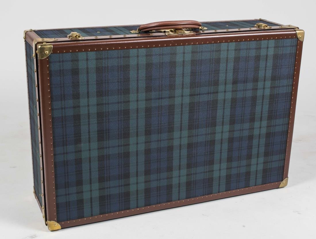 Ralph Lauren Polo Suitcase: With vinyl lined canvas shell with brown leather banding and brass fittings. Height 20 inches, width 30 inches, depth 9 inches. Notice to bidders: Condition reports and additional photographs are prov