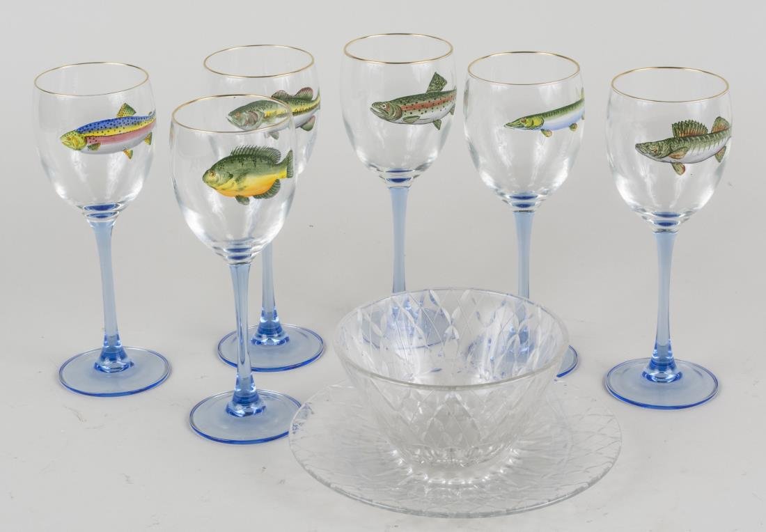 Group of Glassware: Six wine glasses and a colorless glass dish with undertray. Wine glasses, height 7 3/4 inches. Notice to bidders: Condition reports and additional photographs are provided by request as a courtesy to