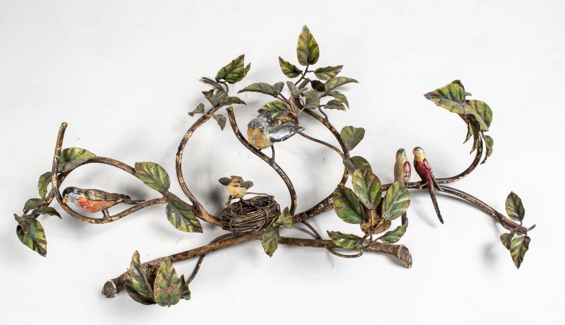 Tole Bird Branch: Naturalistic form with polychrome painted bird, leaf and nest decoration. 16 x 30 inches. Notice to bidders: Condition reports and additional photographs are provided by request as a courtesy to our c