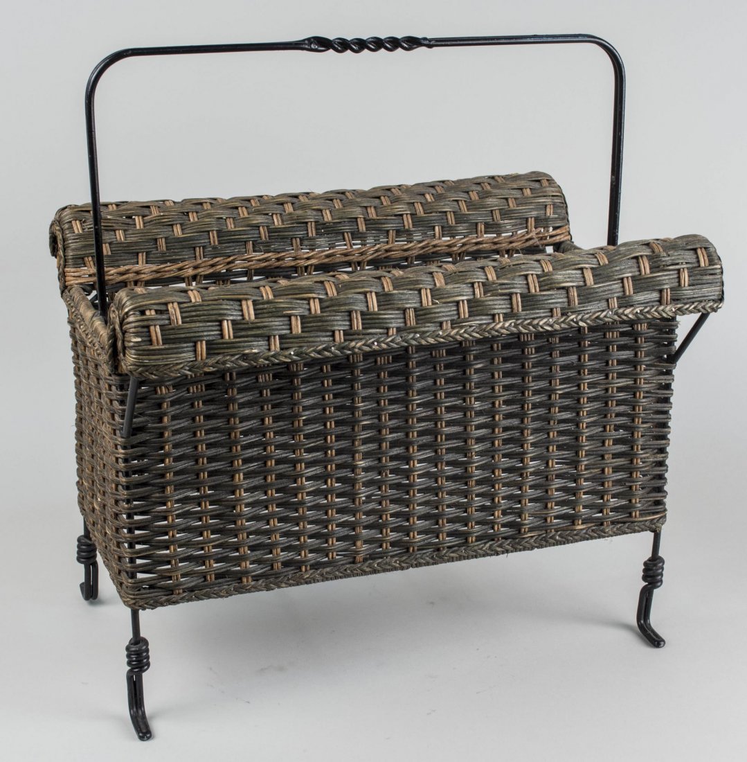 Wicker Magazine Rack: With foxed wire handle. Height 20 inches, width 18 1/2 inches, depth 12 1/2 inches. Notice to bidders: Condition reports and additional photographs are provided by request as a courtesy to our clients