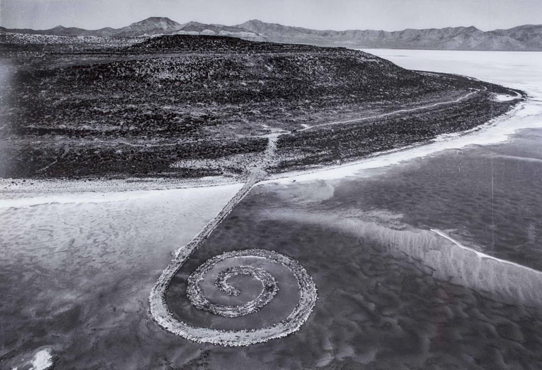 Photograph of Robert Smithson's Spiral Jetty: Spiral Jetty. Black and white photograph laid on plexiglass. Size 34 x 49 inches. Notice to bidders: Condition reports and additional photographs are provided by request as a courtesy to our clients,