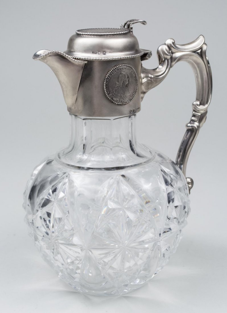 Russian Silver and Crystal Decanter *: By Br. Grachev, decorated with portraits of Czarina Yekaterina (Catherine the Great) and Czar Alexander I., bombe body with star cutting. Height 8 1/4 inches. Notice to bidders: Condition reports and