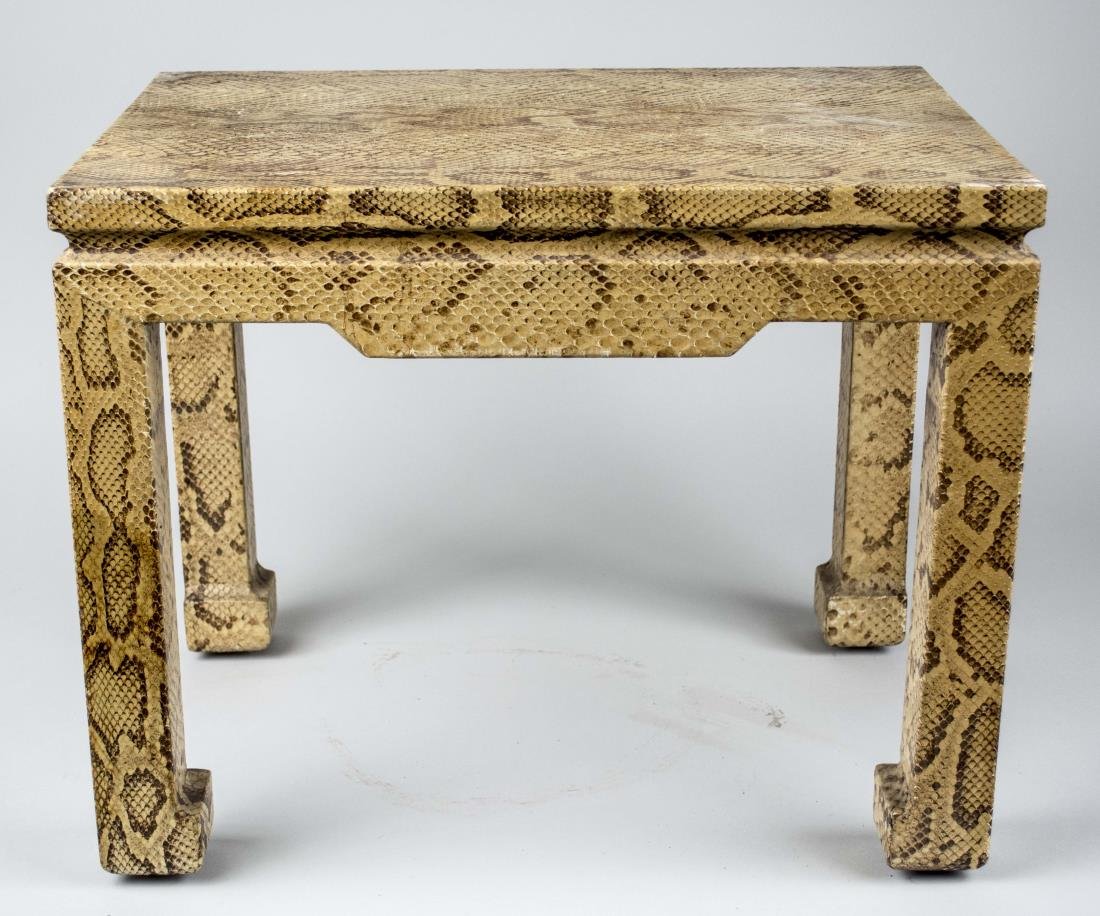 Karl Springer Table: Rectangular top on block legs, simulated python upholstery. Height 16 inches, width 20 inches, depth 14 inches. Notice to bidders: Condition reports and additional photographs are provided by request