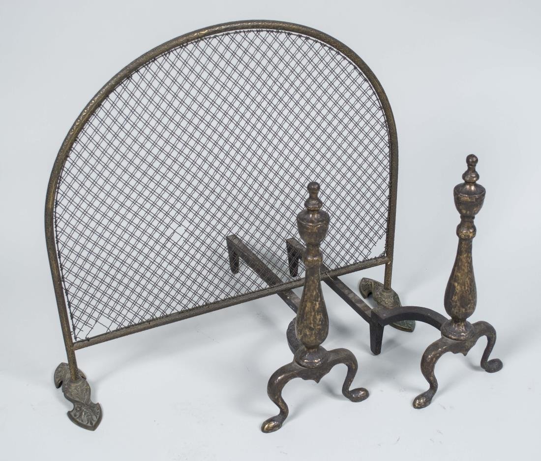 Pair of Andirons and Fire Screen: Baluster form, with scroll legs; together with an arched top fire screen. Andirons, height 17 1/2 inches. Notice to bidders: Condition reports and additional photographs are provided by request as a c
