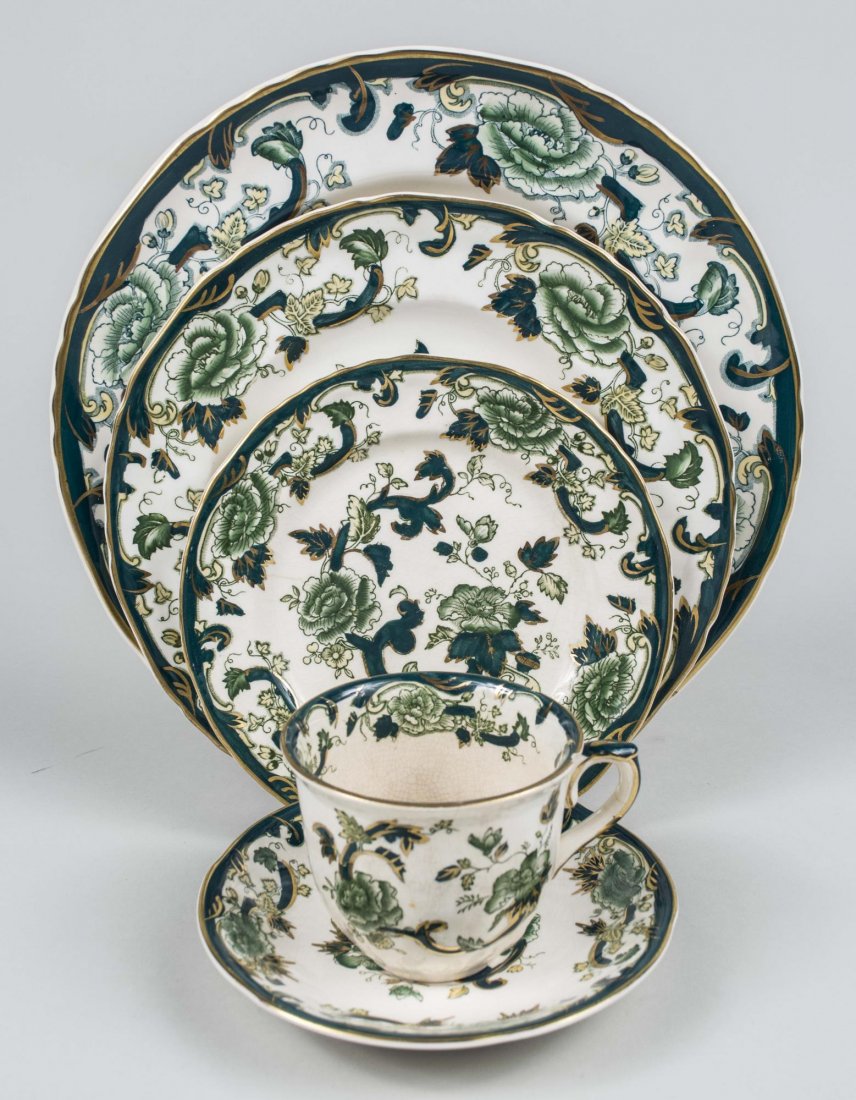 Mason's Ironstone Dinner Service: Chartreuse pattern, comprising twelve dinner plates, twelve salad plates, nine bread plates, eight cream soup bowls with eleven underplates, four soup plates, fourteen cups and saucers, platter, three