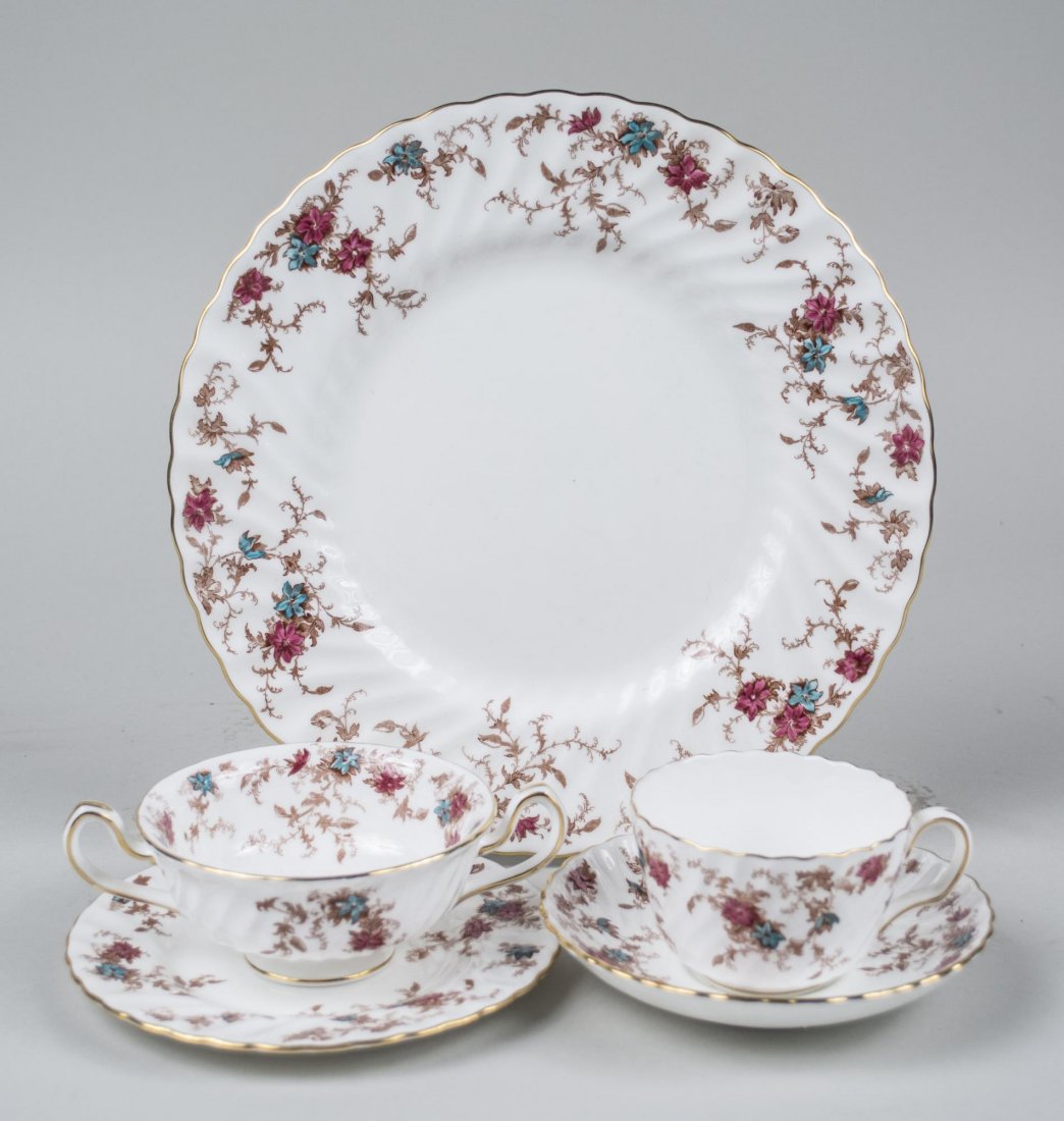 Minton Porcelain Partial Dinner Service: Ancestral pattern (S-376), comprising thirteen dinner plates, fourteen bread plates, twelve soup cups, one soup cup underplate, fourteen cups, and twelve saucers. Dinner plate diameter 10 5/8 inches. 
