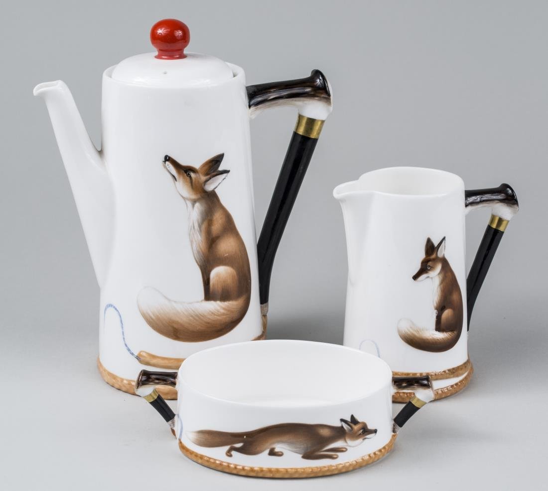 Royal Doulton Porcelain Coffee Set: Reynard the Fox pattern, comprising coffee pot, milk jug and open sugar. Coffee pot, height 8 inches. Provenance: Warren Means Trust. Notice to bidders: Condition reports and additional photographs ar