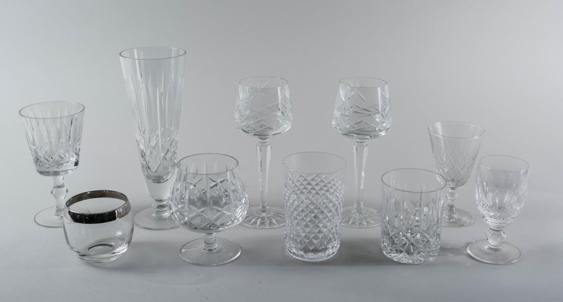 Group of Cut Crystal Stemware and Barware: Approximately sixty five pieces, various makers and patterns including Waterford, comprising goblets, beer glasses, low ball glasses, etc. Notice to bidders: Condition reports and additional photograp