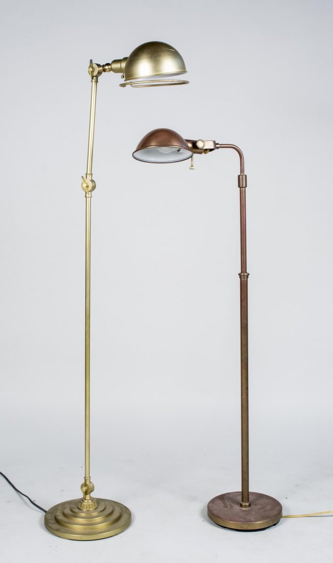 Two Brass Floor Lamps: Both with metal domed shade. Height 62 inches, Provenance: Warren Means Trust Notice to bidders: Condition reports and additional photographs are provided by request as a courtesy to our clients, as s