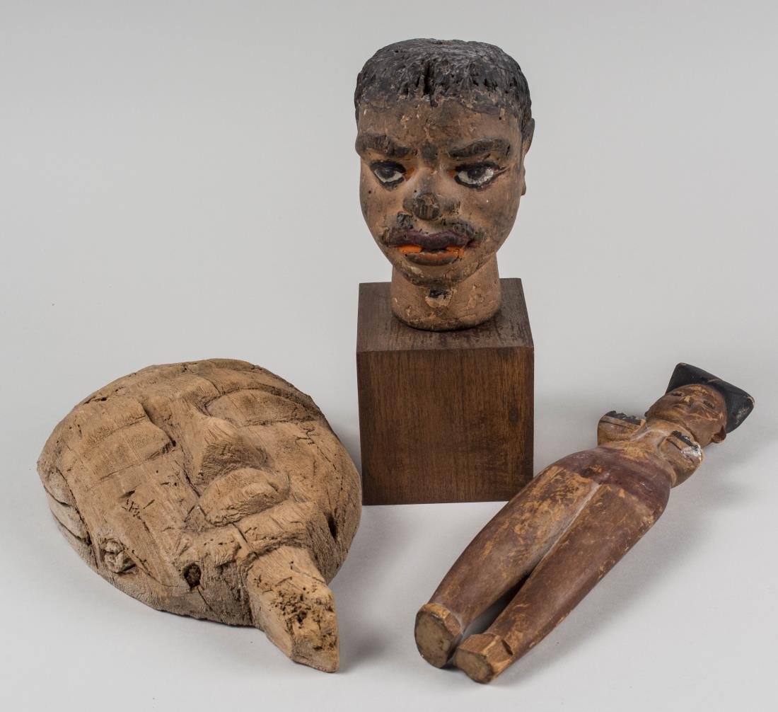Three African Carved Wood Articles: Mask, female fertility figure and a polychrome painted head on stand. Figure, height 12 inches. Provenance: Warren Means Trust Notice to bidders: Condition reports and additional photographs are provi