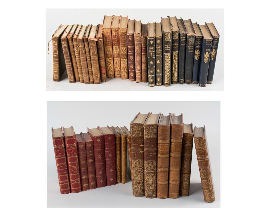 Group of Leather Bound Books: Late 19th/Early 20th century, thirty two books, including the Iliad of Homer, The Works of Robert Burns, Les Miserables by Victor Hugo, The Complete Works of Shakespeare, The Count of Monte Cristo by