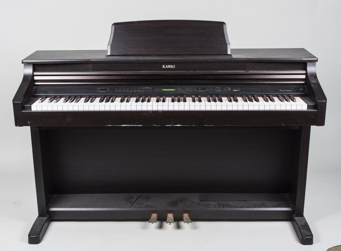 Kawai Digital Piano: Model CA 950, serial number 9342715, black ebonized case. Height 42 inches, width 56 inches, depth 20 inches. Notice to bidders: Condition reports and additional photographs are provided by request as