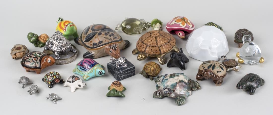 Miscellaneous Group of Turtle Figurines: Approximately forty five pieces, pottery, porcelain, composite, glass, seashell and metal examples, including two silvered metal figures. Various sizes. Notice to bidders: Condition reports and additi