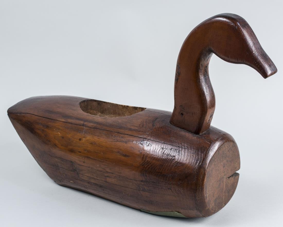 Folk Art Duck Decoy Lamp Base: Carved wood. Height 17 inches. Notice to bidders: Condition reports and additional photographs are provided by request as a courtesy to our clients, as such any condition report is only an opinion and