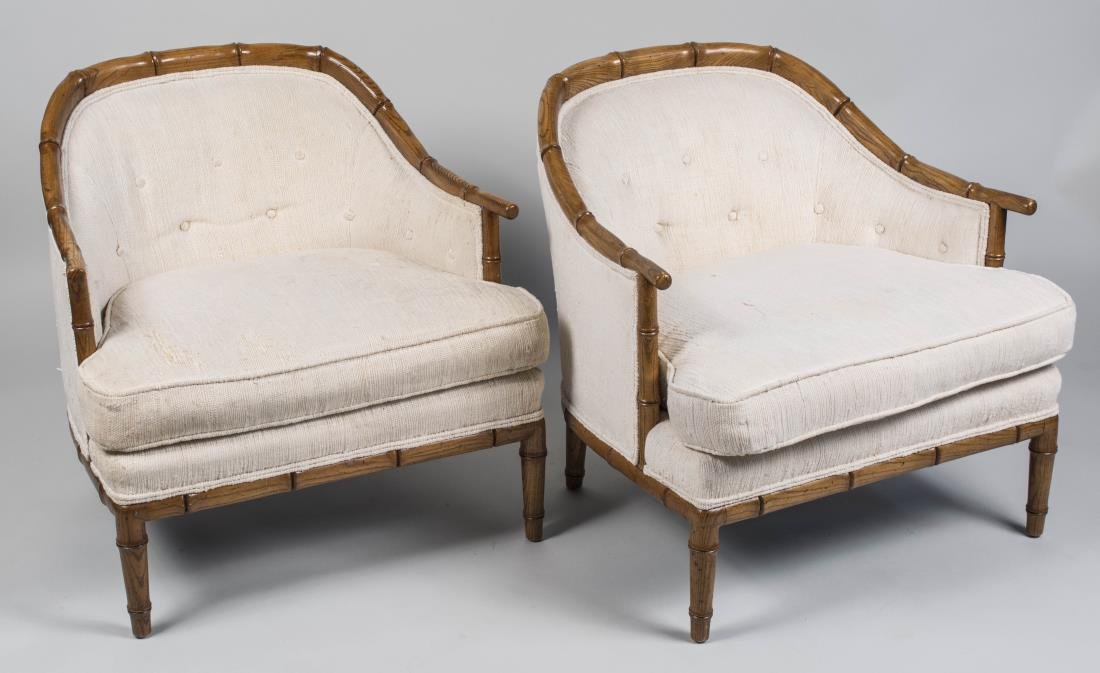 Pair of Henredon Club Chairs: Each a tub back chair with faux bamboo decoration, cushion seat, ivory upholstery. Height 30 inches, width 29 inches, depth 29 inches. Notice to bidders: Condition reports and additional photographs a