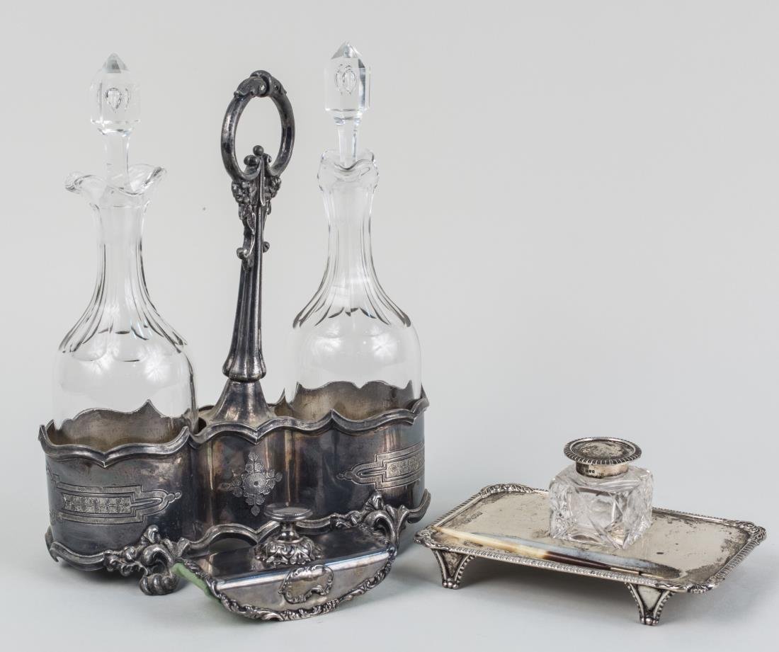 Group of Silver and Silver Plated Articles: English silver ink stand, silver plated cruet stand with two bottles and a blotter. Notice to bidders: Condition reports and additional photographs are provided by request as a courtesy to our clients