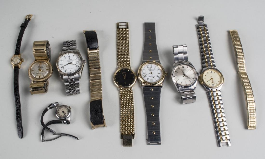 Group of Watches: Including a Bulova Selfwinding 30 jewels, lady's Gruen watch, lady's Le Trianon watch, two imitation Rolex watches, etc. Notice to bidders: Condition reports and additional photographs are provided by