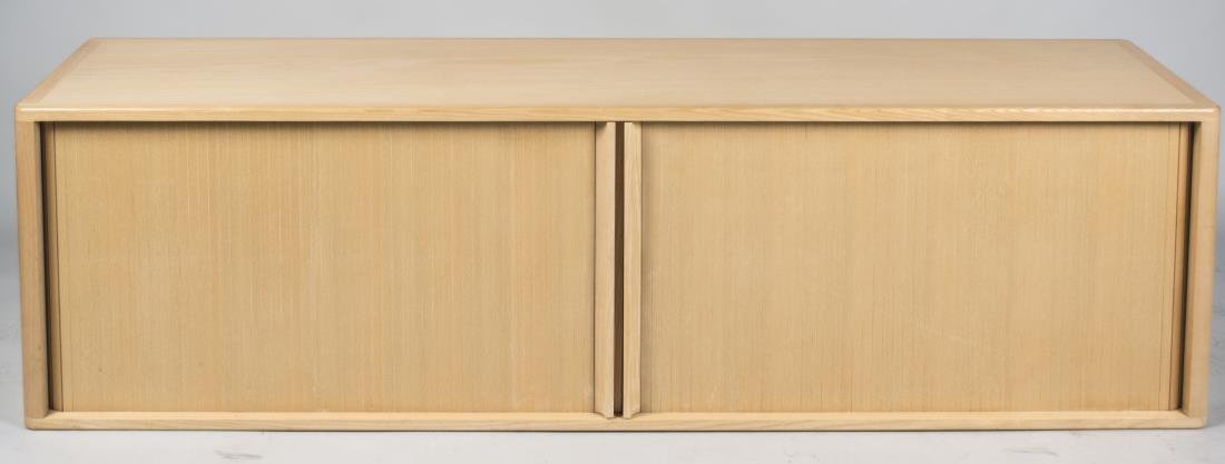 Bassam Fellows Solid Ash Wall Mounted Credenza: Rectangular two door cabinet. Height 20 inches, width 72 inches, depth 18 inches. Notice to bidders: Condition reports and additional photographs are provided by request as a courtesy to our clients, 