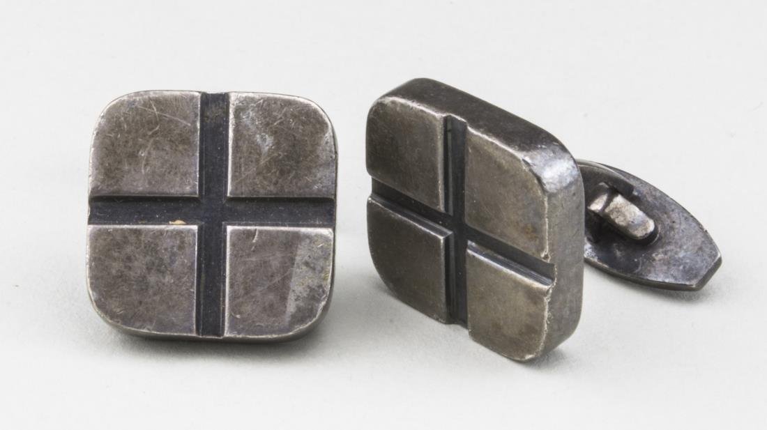 Pair of Scandinavian Silver Cufflinks: Designed as squares with rounded corners and recessed blackened cross, marked 925S and Denmark, also numbered 633. Notice to bidders: Condition reports and additional photographs are provided by reque