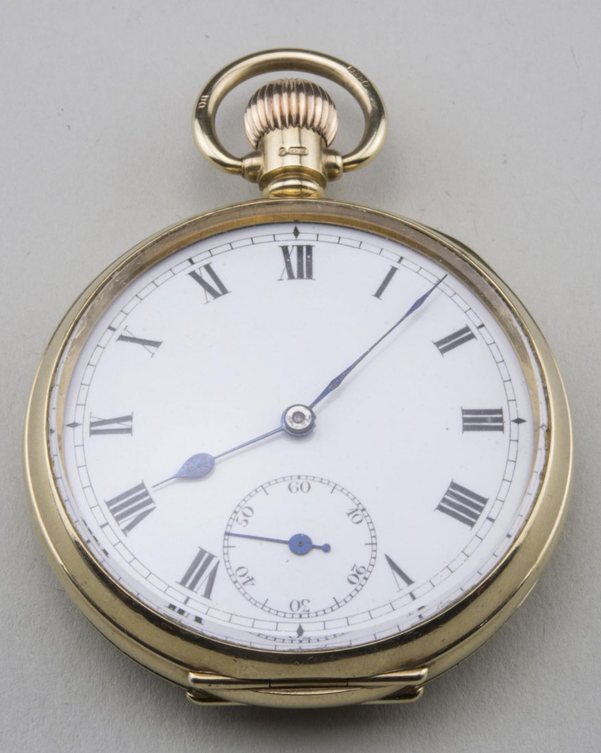 Swiss Gold Pocket watch: 10k yellow gold pocket watch, enamel dial with Roman numerals and subsidiary seconds dial, diameter 1 3/4 inches, case marked 375. Notice to bidders: Condition reports and additional photographs are p