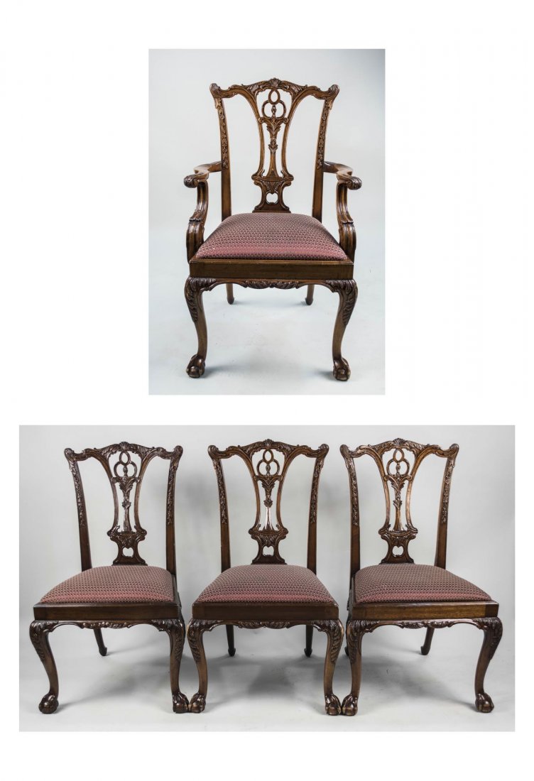 Set of Four Chippendale Style Chairs: One armchair and three side chairs, each with openwork splat, upholstered seat, and cabriole front legs ending in ball and claw feet. Height 41 inches, width 25 inches, depth 21 inches. Notice to bidd
