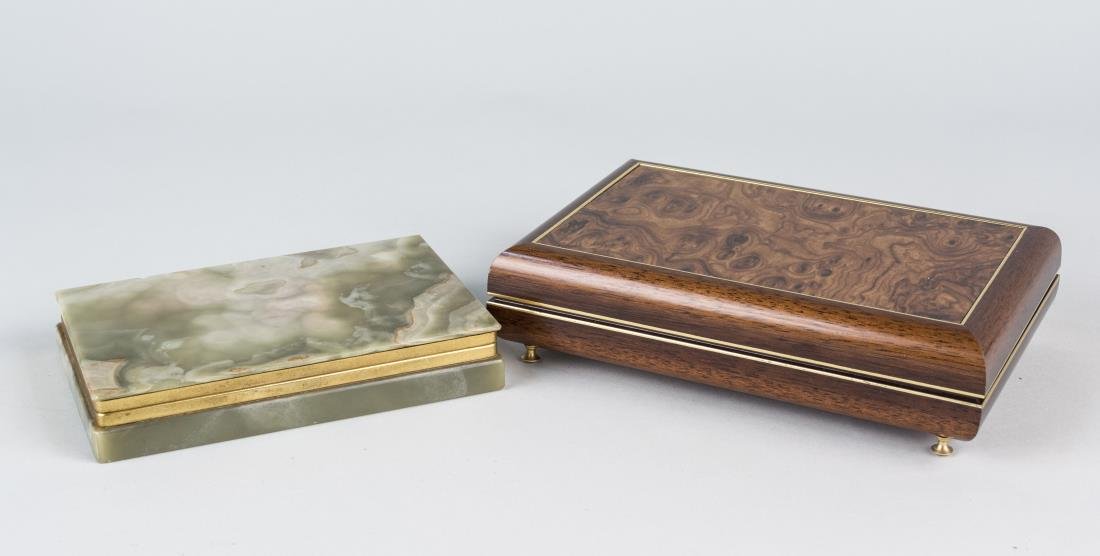 Two Decorative Boxes: Italian wood music box and a green onyx box. Larger, height 2 1/2 inches, width 9 inches, depth 6 inches. Notice to bidders: Condition reports and additional photographs are provided by request as a c