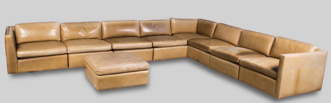 Knoll Leather Sectional Sofa: L-shaped sectional sofa with matching ottoman, in nine pieces. Height 27 inches, width 12 feet 3 inches, depth 10 feet. Notice to bidders: Condition reports and additional photographs are provided by