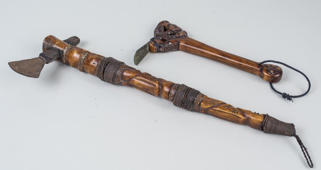 Two Primitive Style Tools: Including a Aboriginal stone adze, and an African carved bone handled tomahawk. Notice to bidders: Condition reports and additional photographs are provided by request as a courtesy to our clients, as