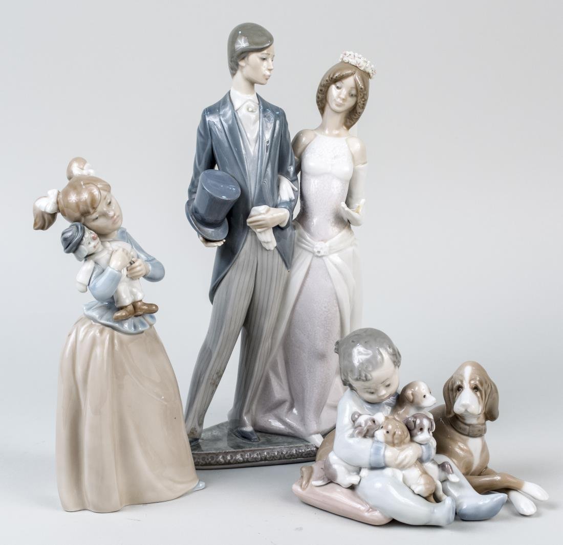 Two Lladro Porcelain Figures: Comprising #5456 New Playmates, sculpted by Antonio Ramos, issued in 1988 and retired in 2005, and #1404 Wedding (missing bouquet), sculpted by Juan Huerta, issued in 1982 and retired in 1998;Together