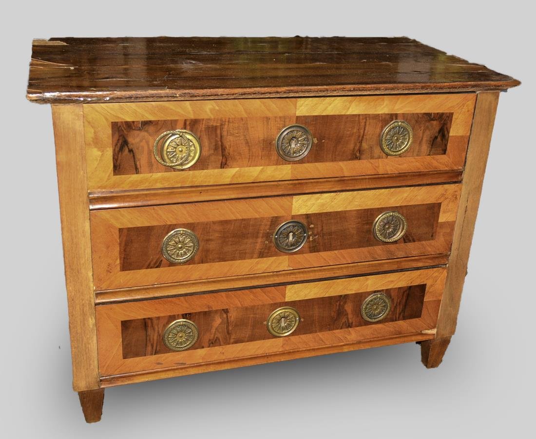 Austrian Walnut Marquetry Commode: Rectangular top over three drawers on block tapered legs. Height 24 inches, width 32 inches, depth 17 inches. Notice to bidders: Condition reports and additional photographs are provided by request as
