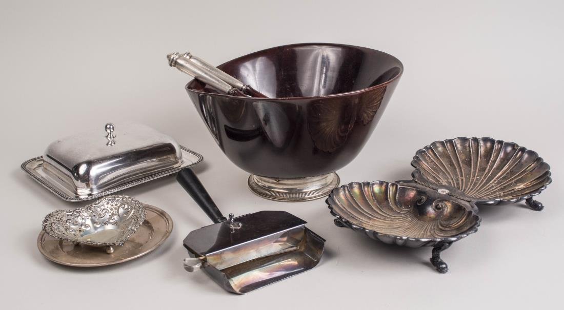 Group of Sterling and Silver Plated Articles: Including an English silver plated covered entree dish, a shell form divided dish, a silent butler, sterling silver mounted wood salad set, two sterling silver small dishes. Notice to bidders: Conditi